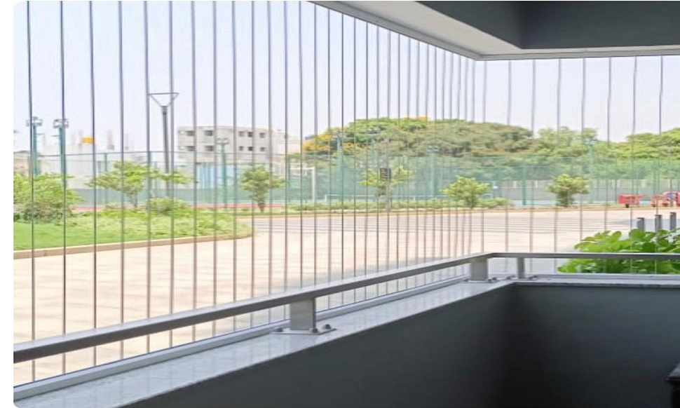 Invisible Grills installation for balconies and windows by Jashuva Safety Nets